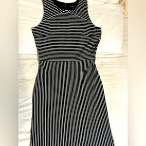 Black stripped dress to the knees, size 10 from Banana republic.